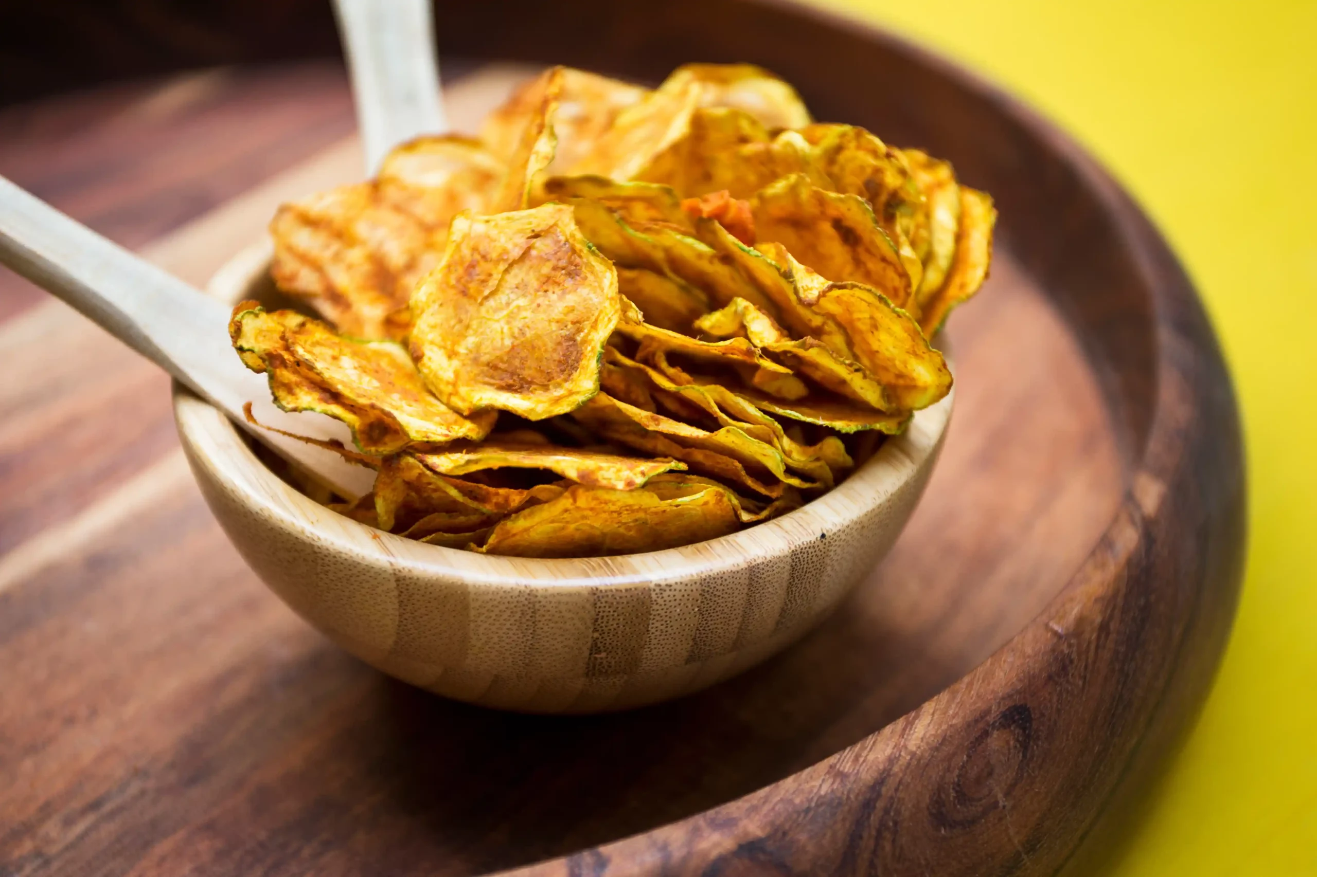 Indulge in a guilt-free snack with our Gluten-Free Cheesy Courgette Chips recipe. Easy to make and packed with flavour!